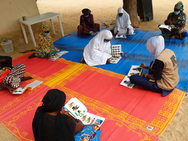 Aishatu conducting community awareness sessions in the field